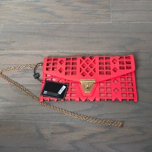 MMS Fucsia clutch